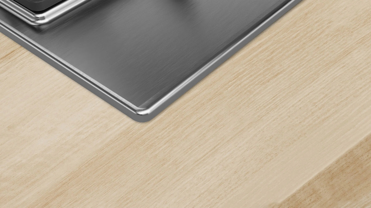 Bosch PCP6A5B90 stainless steel hob corner detail